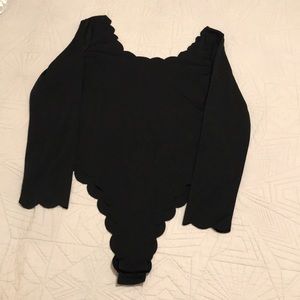Women’s scalloped black body suit